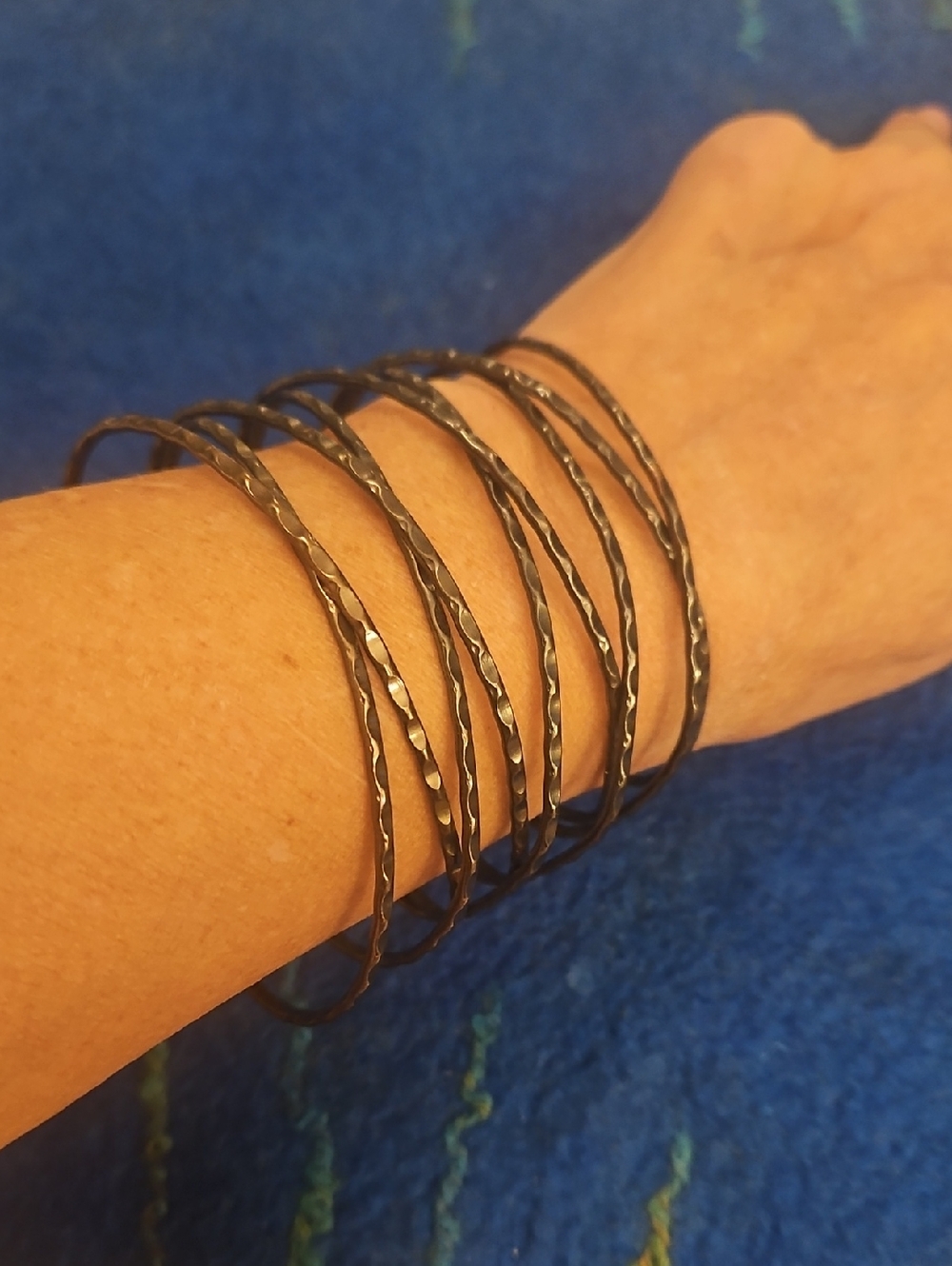 3 For $10  Handcrafted Black Hammered Bangle .